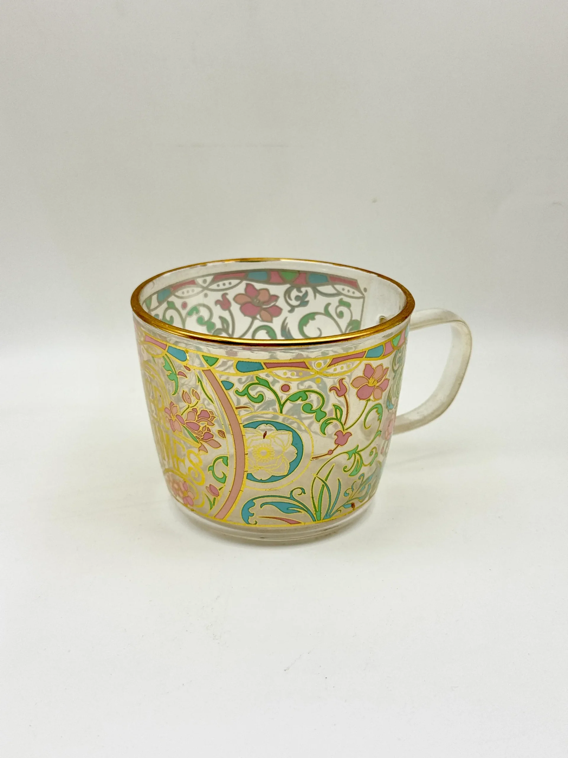 Gold-rim floral pattern glass tea cup — decoration sample