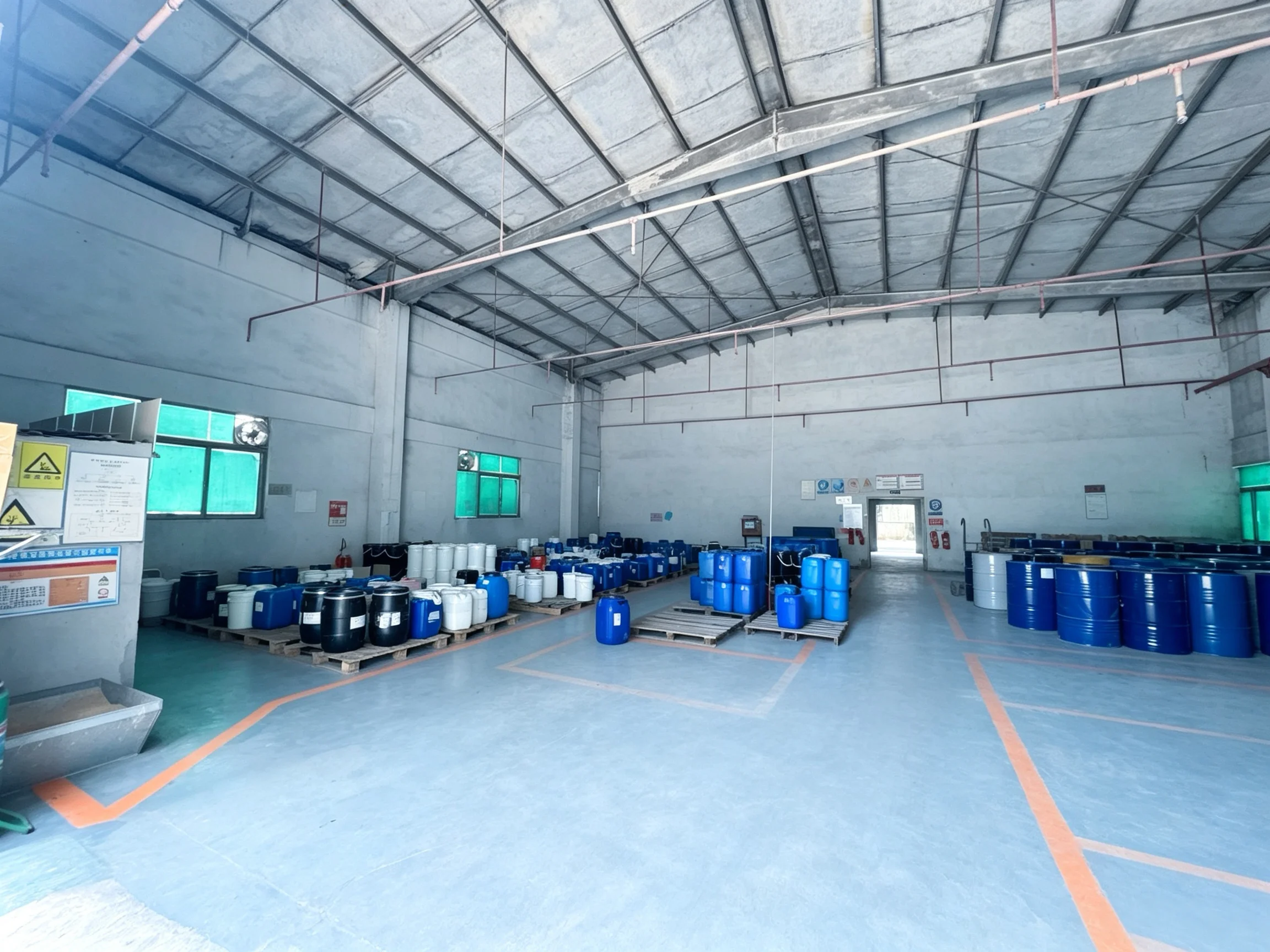 linkonink storage area — ink drums neatly arranged