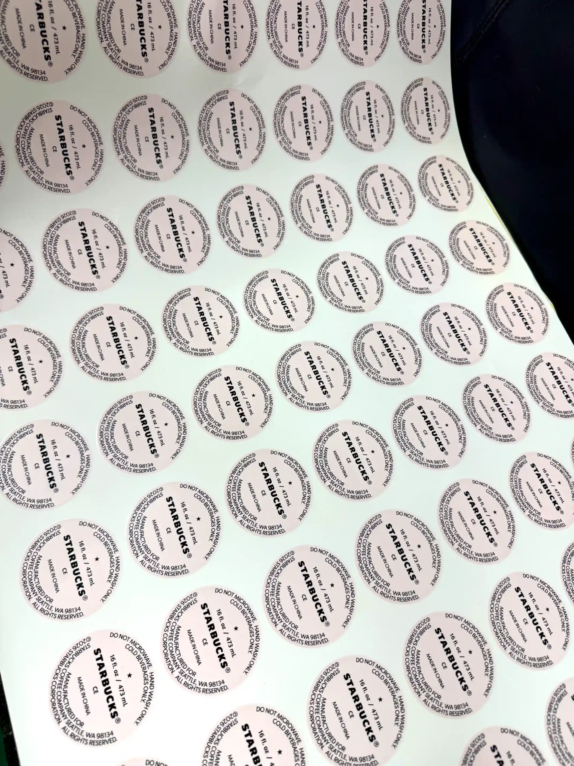 Circular fine-text identifier waterslide decals showing small-type printing
